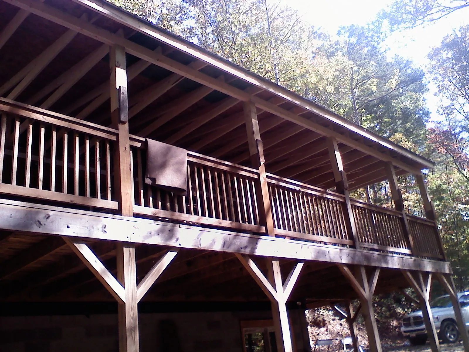 Timber framing under a new elevated porch and deck — Roof Leak Repair in Woodacre by Roofing Brothers